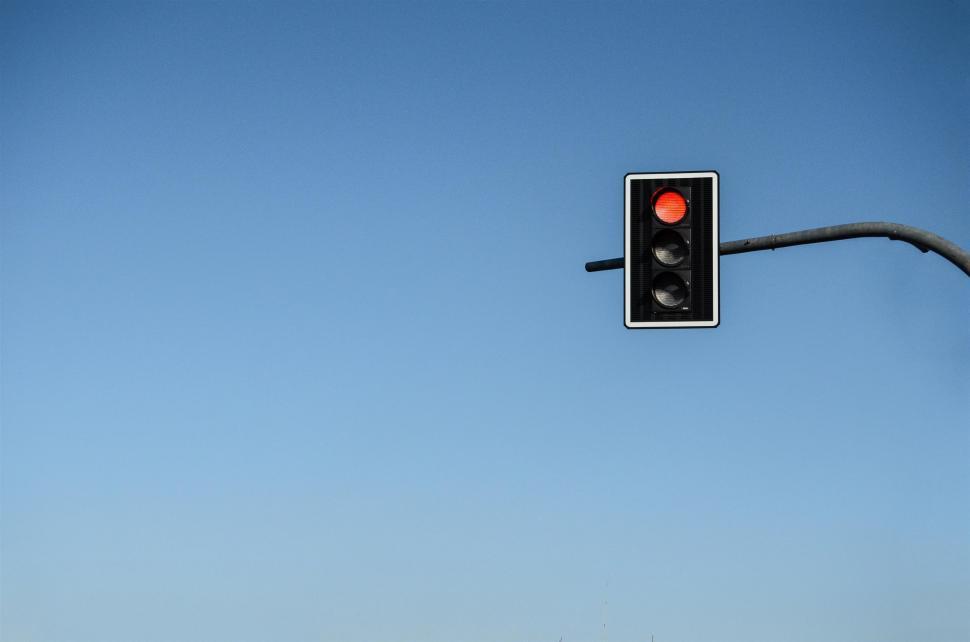 Free Image of Traffic Light Hanging From Metal Pole 