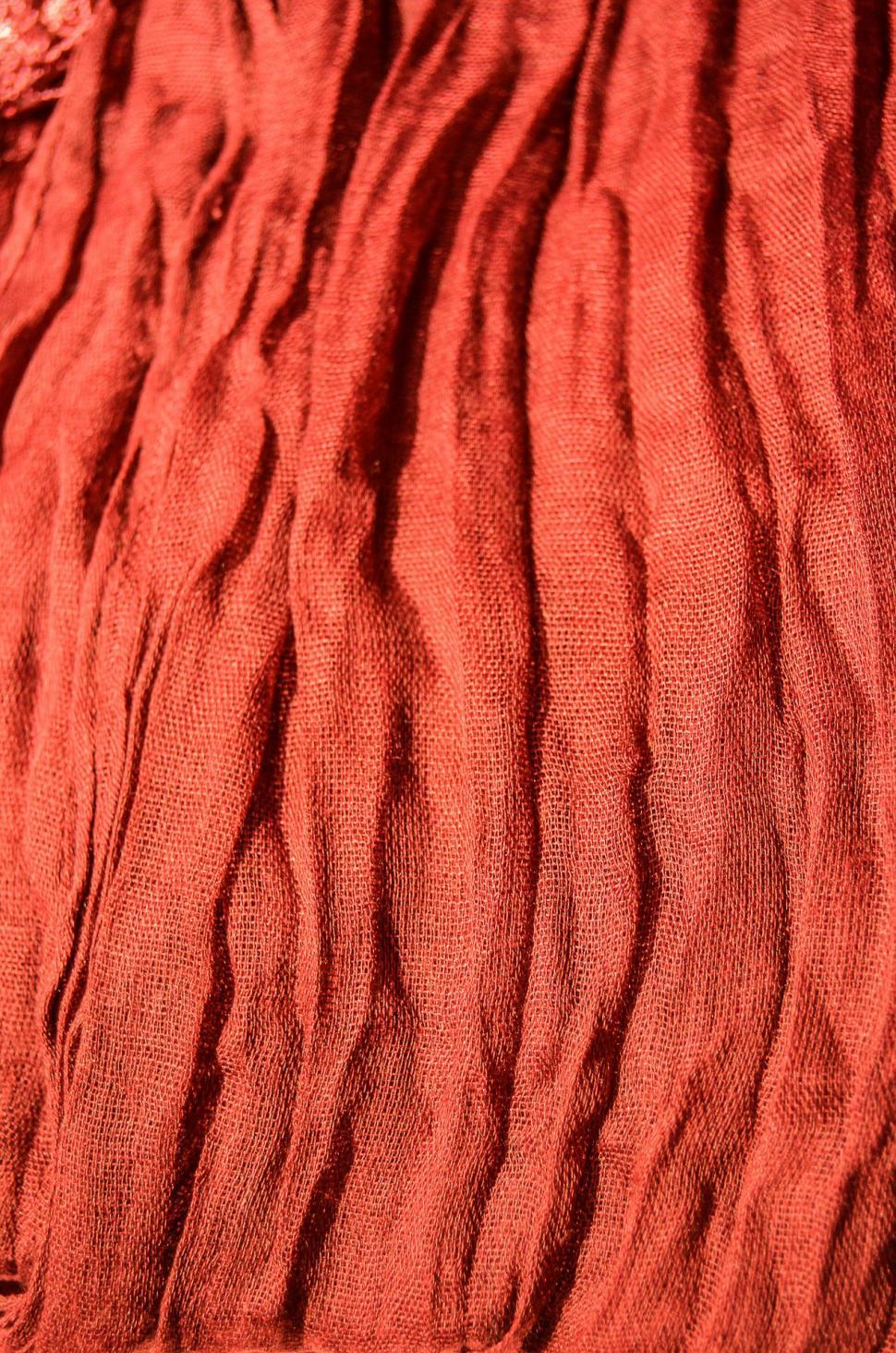 Free Image of Close-Up of Red Cloth With Pattern 
