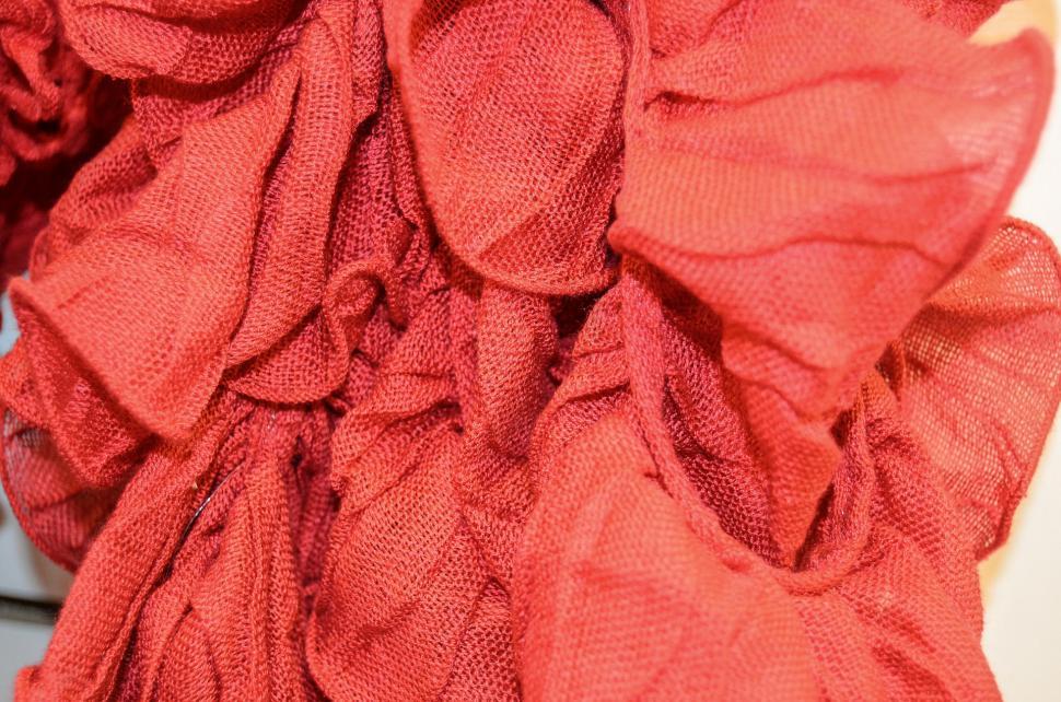 Free Image of Close Up of Red Scarf on Table 