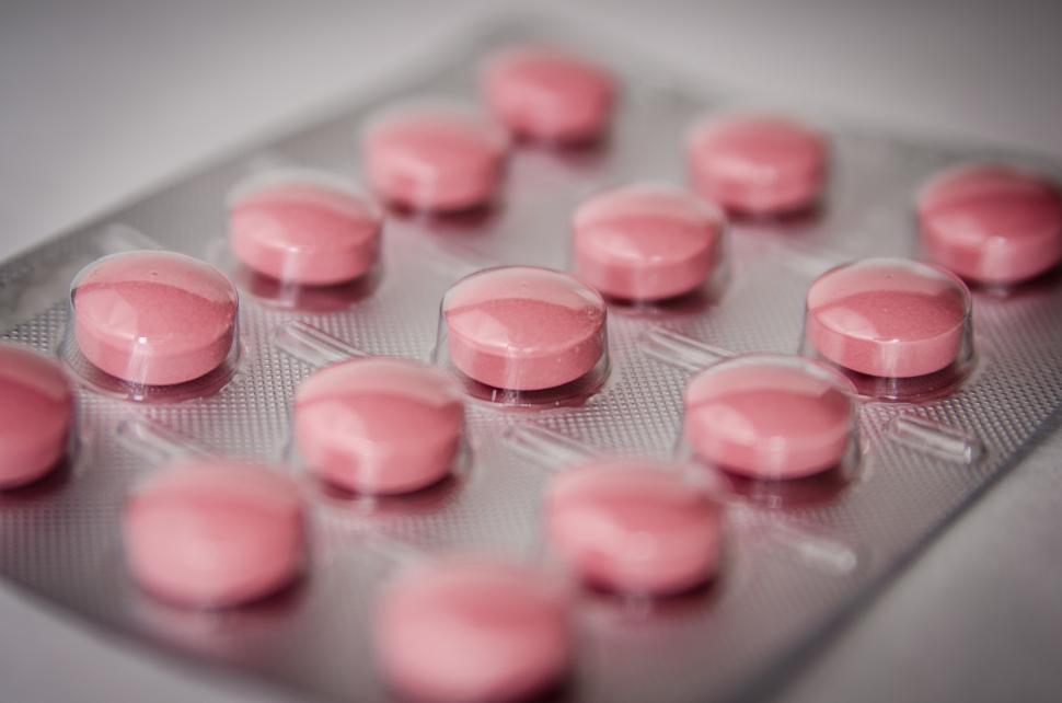 Free Image of Close Up of Pink Pills in a Blister 