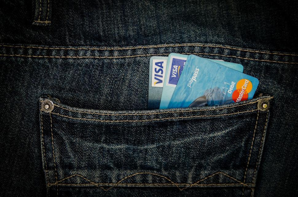 Free Image of Credit Card Protruding From Back Pocket of Jeans 
