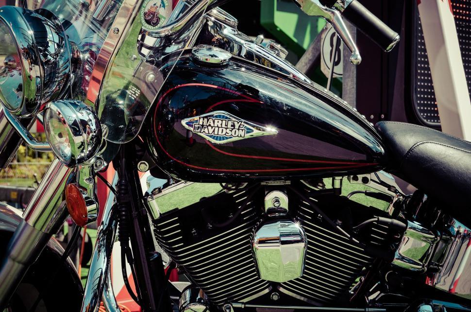 Free Image of Close Up of a Parked Motorcycle in a Parking Lot 