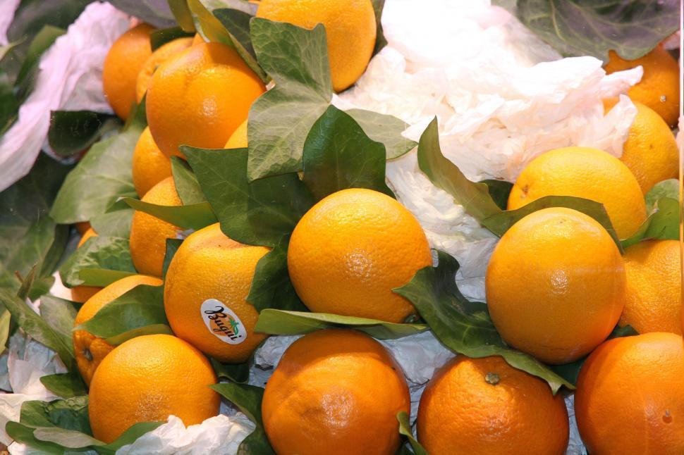 Free Image of A Bunch of Oranges on a Table 