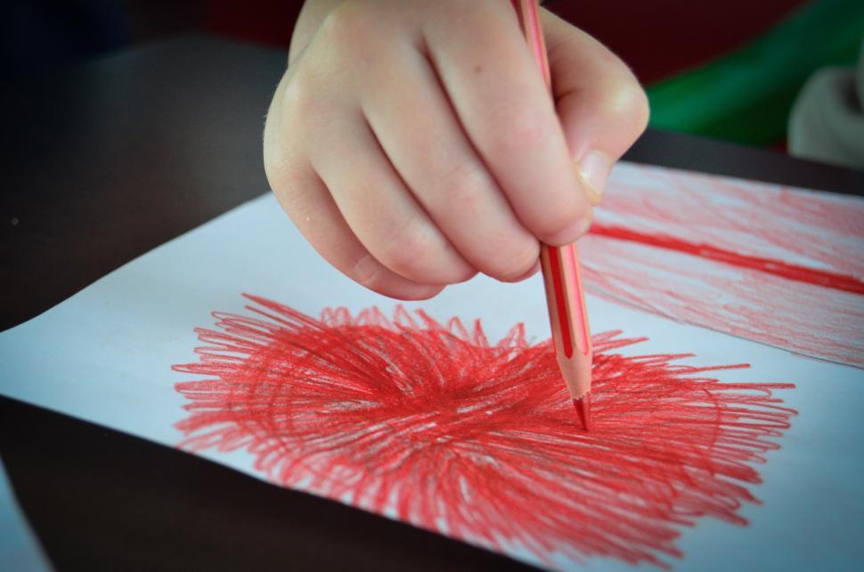Free Image of Child Drawing Heart on Paper 