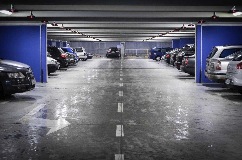 Free Image of Busy Parking Garage With Many Parked Cars 