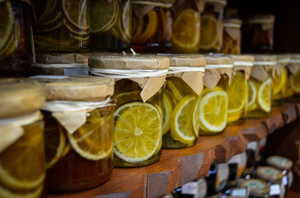 Free Image of Shelf Filled With Jars of Lemons 