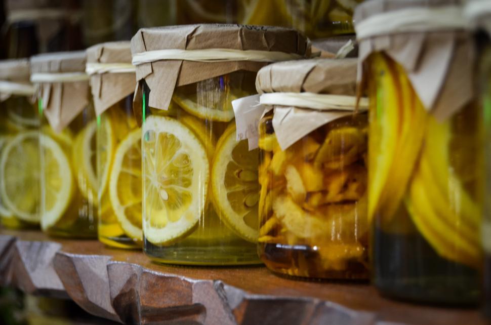Free Image of Row of Jars Filled With Lemon Slices 