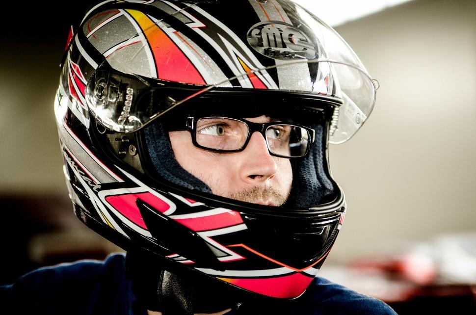 Free Image of Man Wearing Motorcycle Helmet and Glasses 