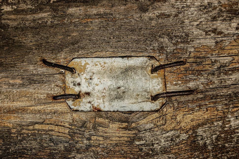 Free Image of Wooden Surface With Metal Plate 