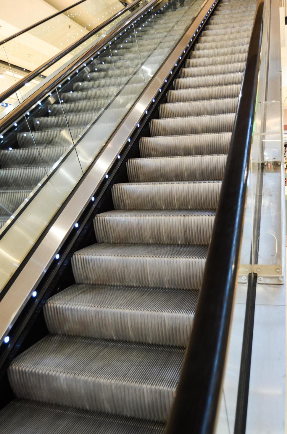 Free Image of Escalator With Stairs Leading Up 