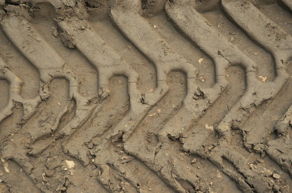 Free Image of Close Up of Tire Track in Sand 