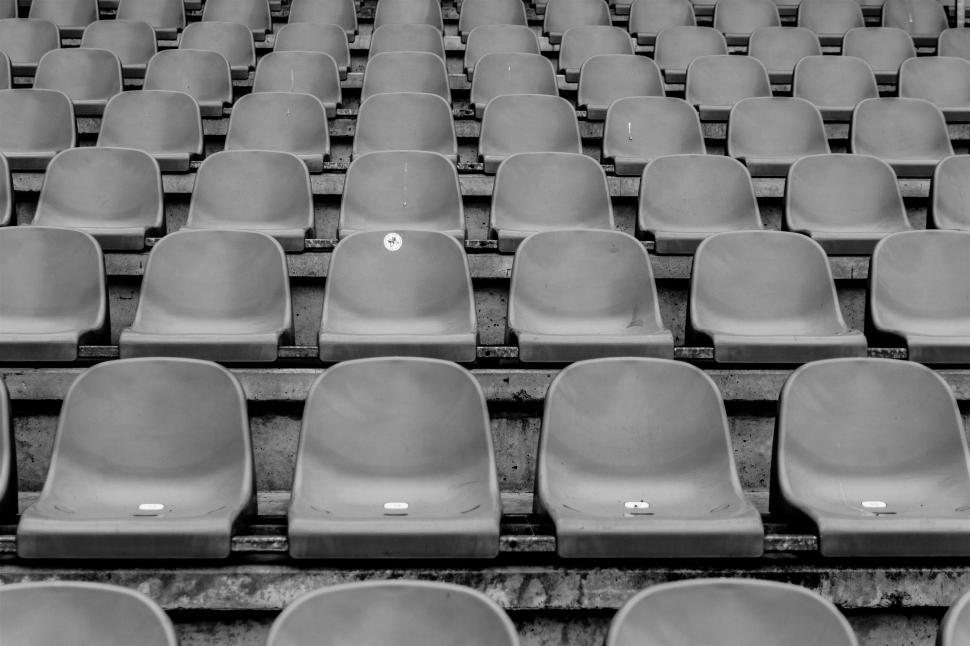 Free Image of Row of Empty Seats in Black and White 