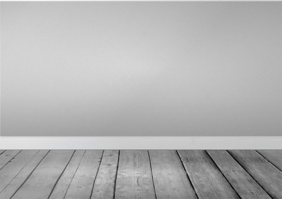 Free Image of Empty Room With Wooden Floor and White Wall 