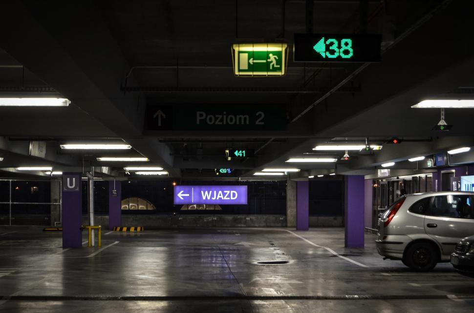 Free Image of Busy Parking Garage Filled With Parked Cars 