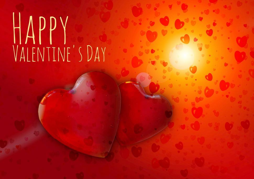 Free Image of Two Hearts on a Red Background With the Words Happy Valentines Day 