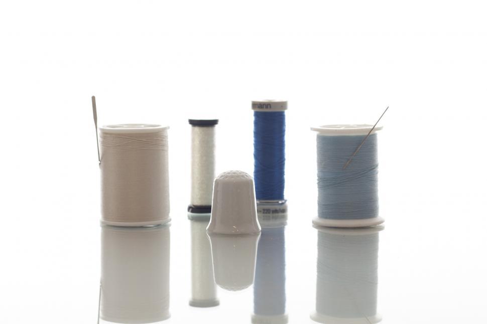 Free Image of Thimble with different threads 