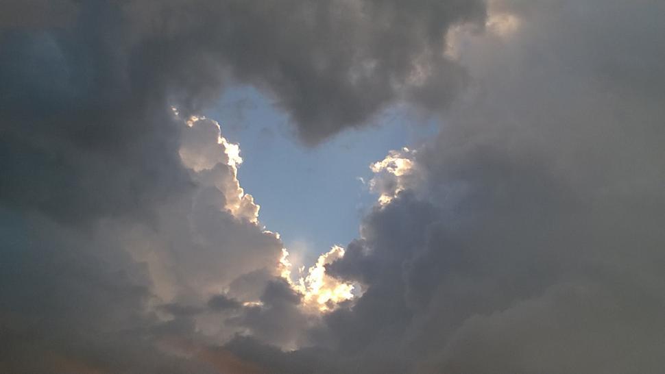 Free Image of Clouds with Heart Shaped Break  