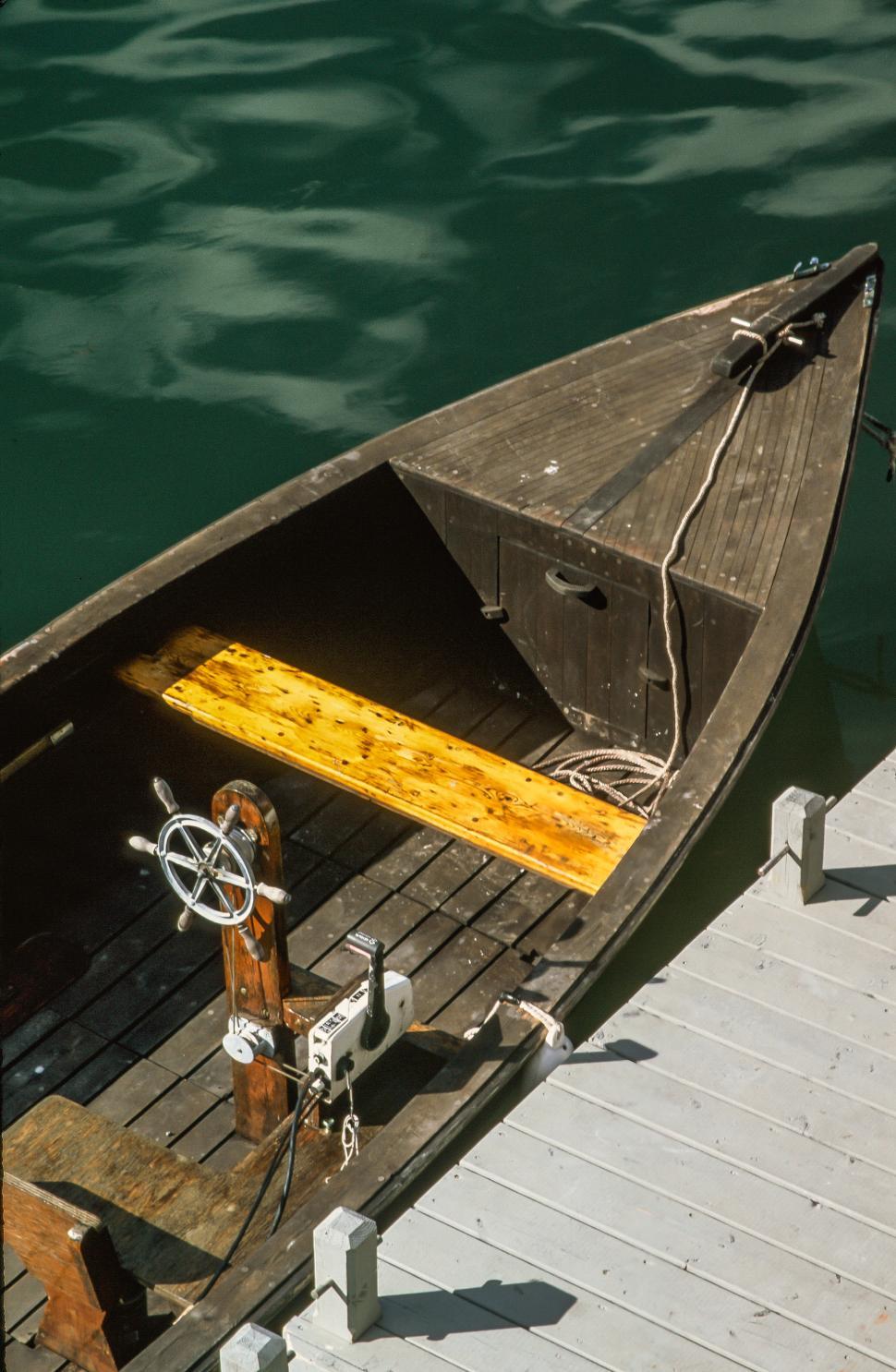 Free Image of Boat tied to the dock 