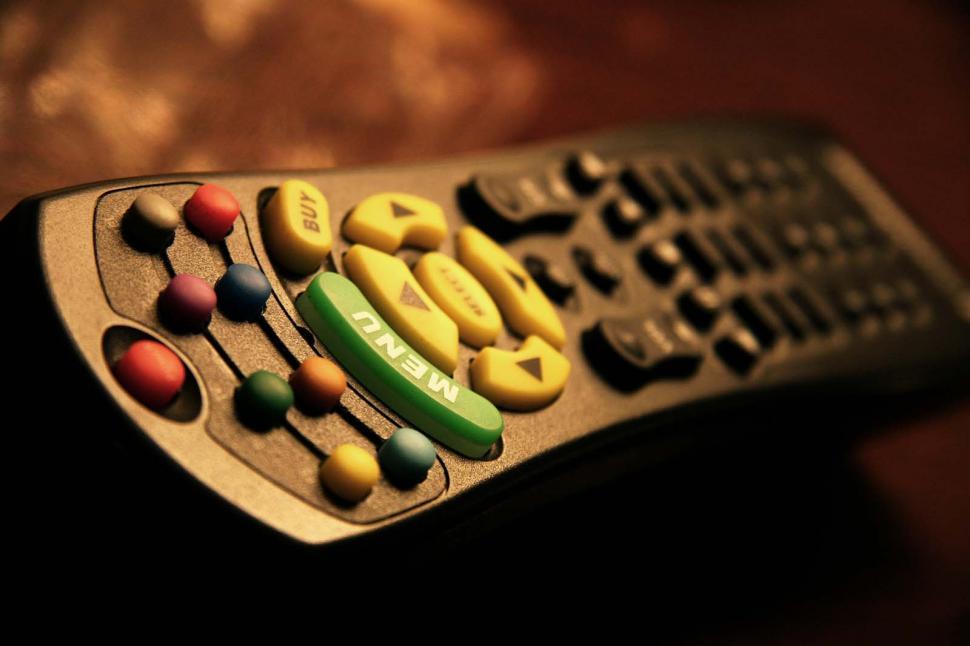 Free Image of Close Up of Remote Control With Pills 