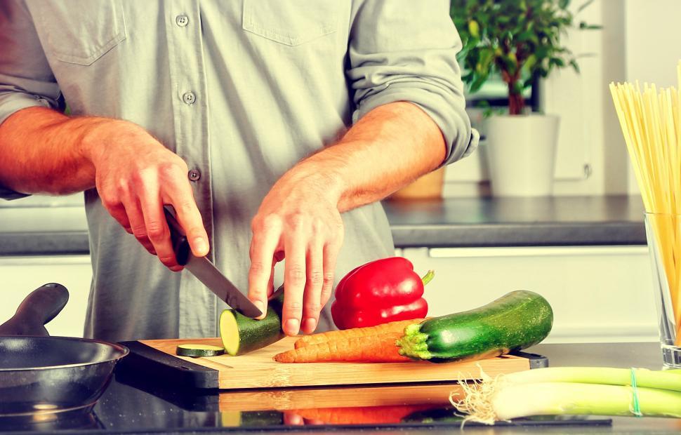 Download Free Stock Photo of Cooking - A Man Chopping Veggies 