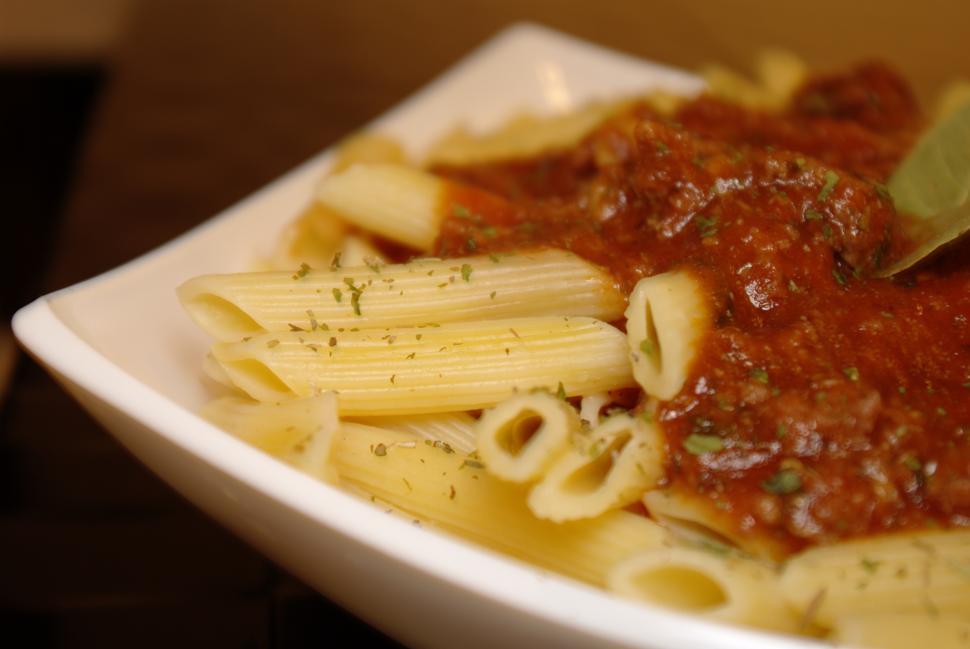 Free Image of White Bowl Filled With Pasta and Sauce 