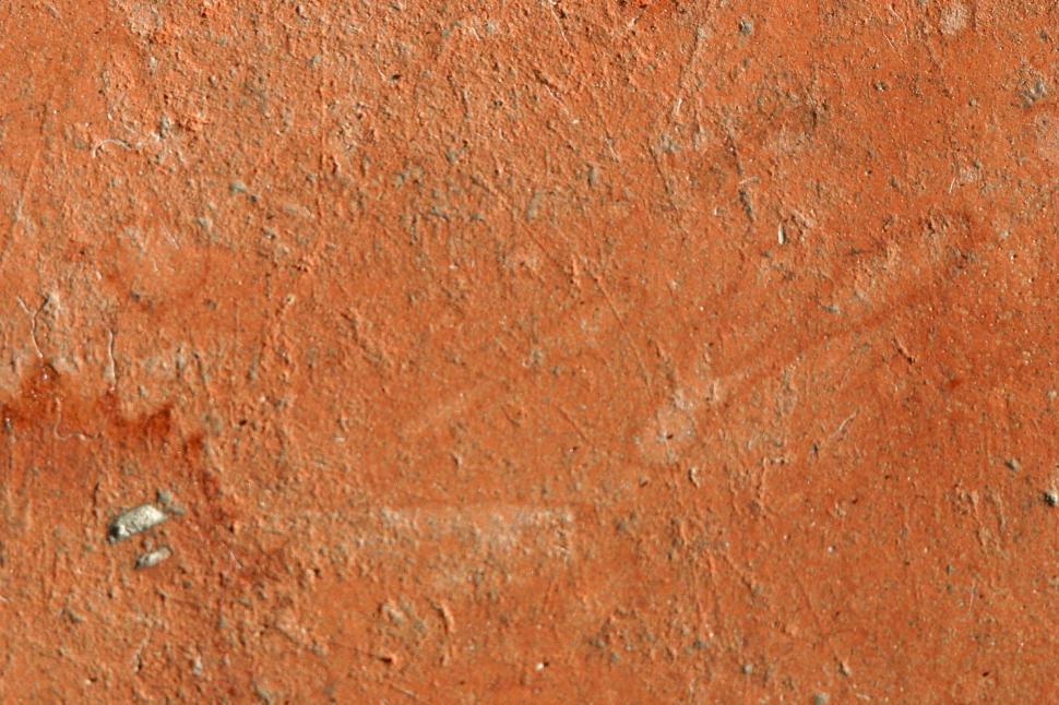 Free Image of Promitive red ceramic tile background 