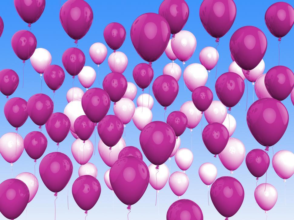 Free Image of Floating Purple And White Balloons Show Girly Birthday Party 