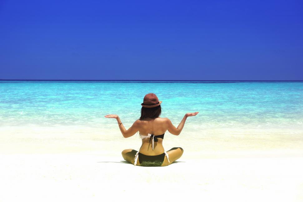 Free Image of Woman Practicing Yoga on the Beach - Vivid Colors 