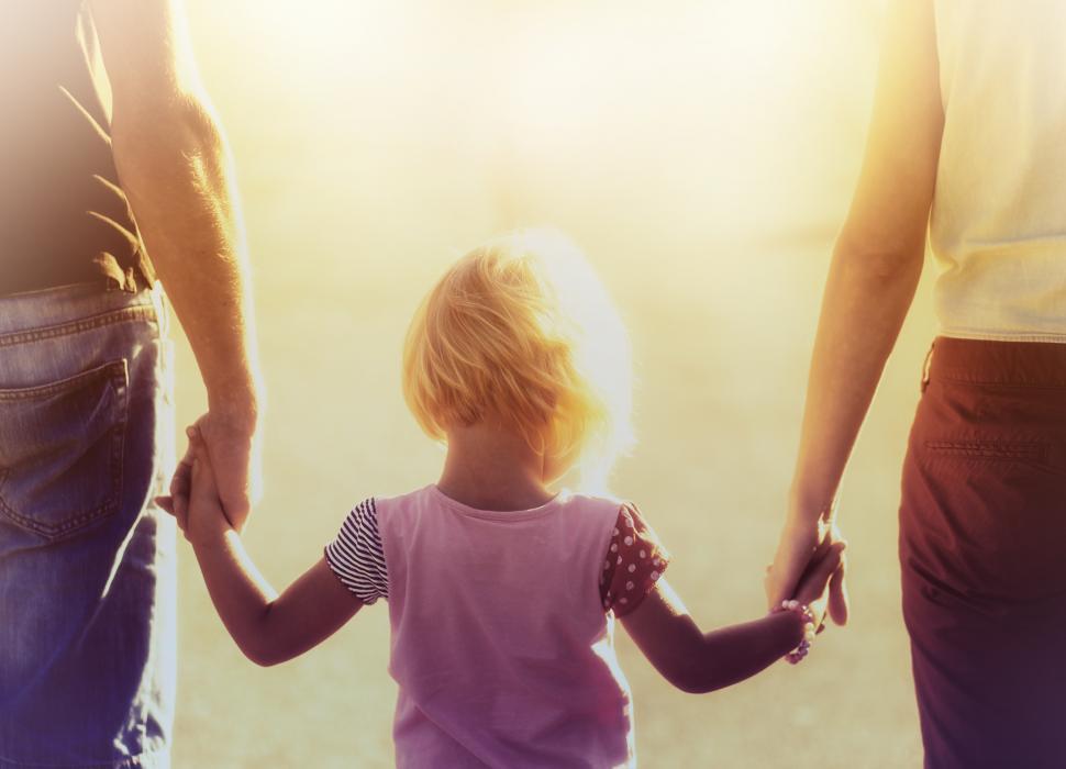 Download Free Stock Photo of Into the Light - Parents Hold Hands with small Child 