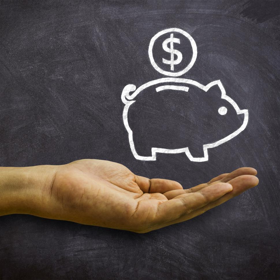 Free Image of Piggy Bank on Blackboard - Savings and Economies Concept 