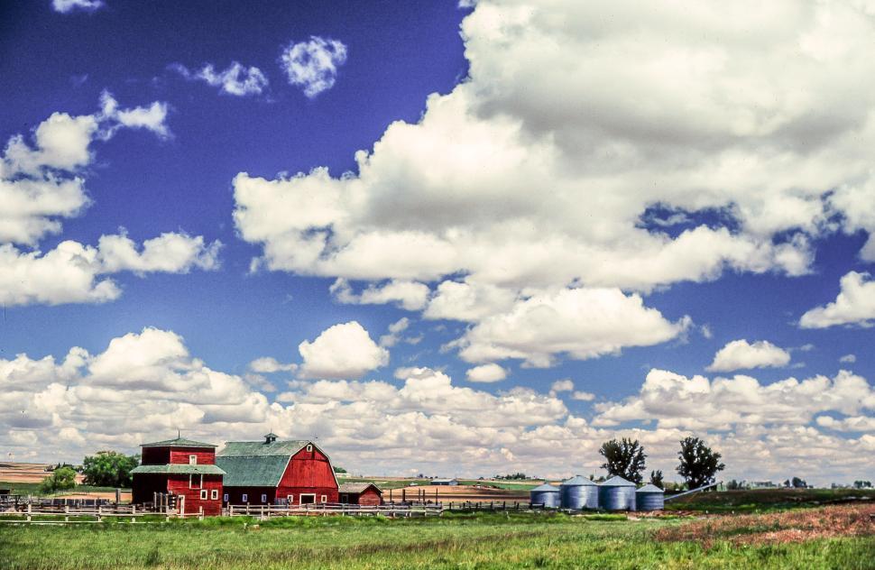 Free Image of White Clouds over Farmland 