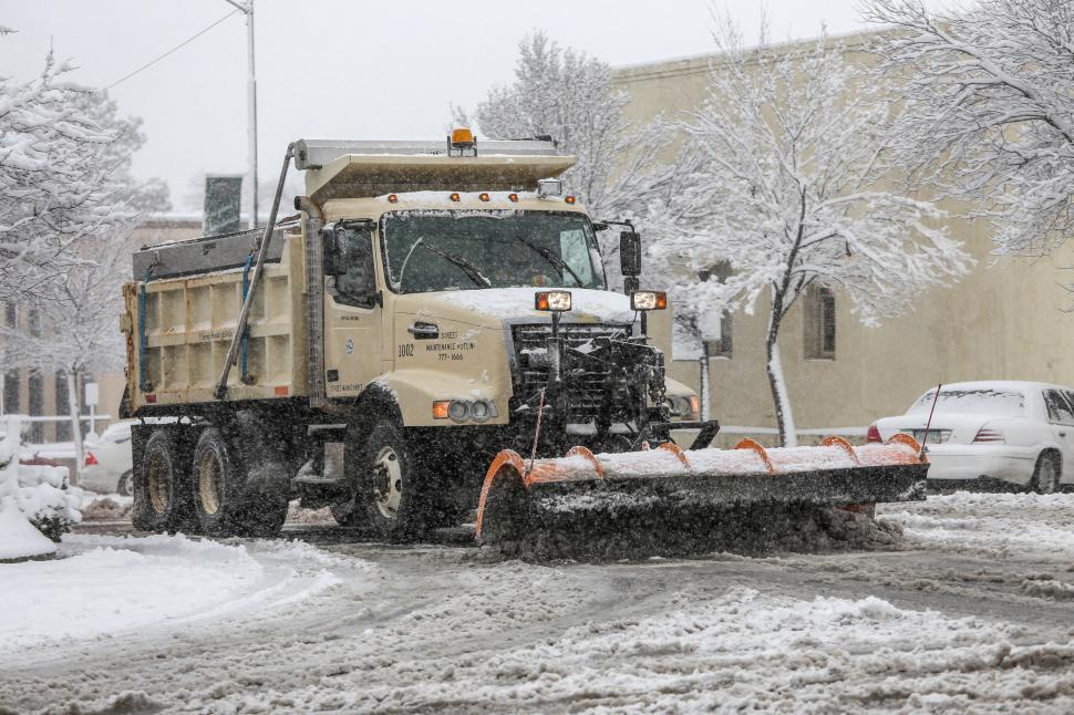 Free Image of Snow plow working the streets 