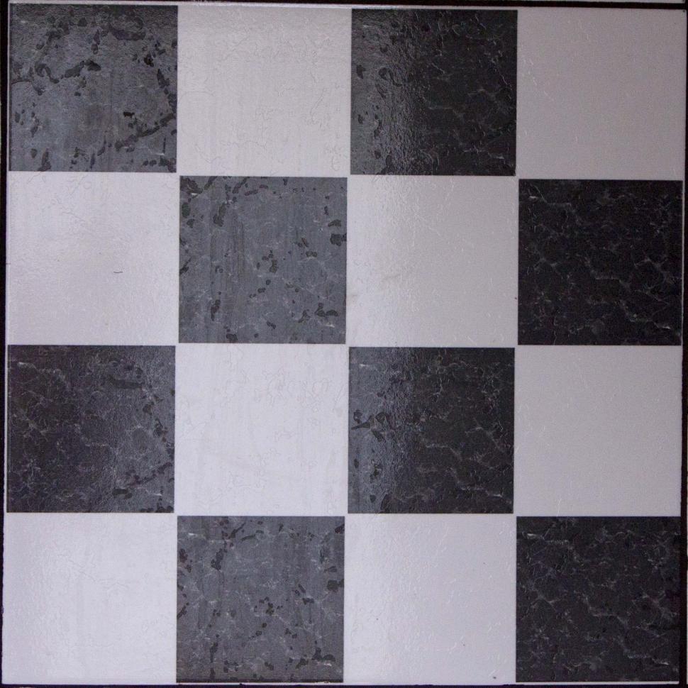 Free Image of Black and White Checkered Tile With Black Border 
