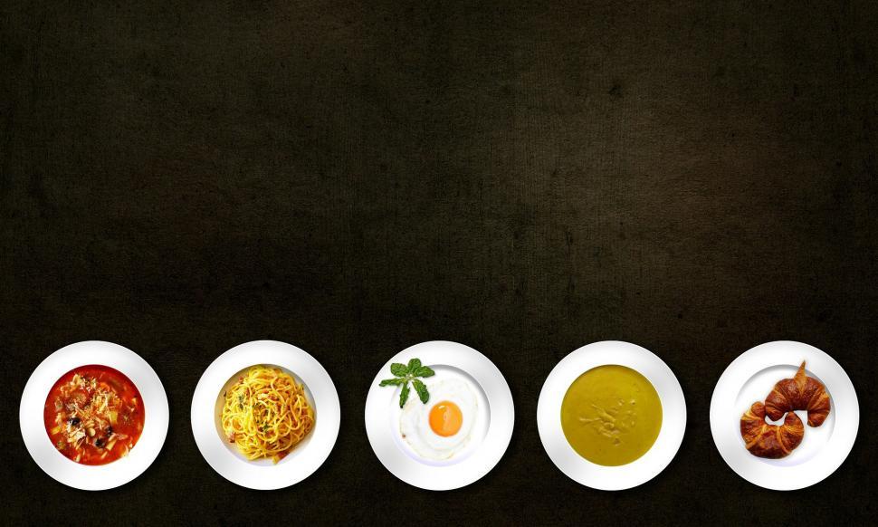 Free Image of Variety of Food on a Row of Plates 