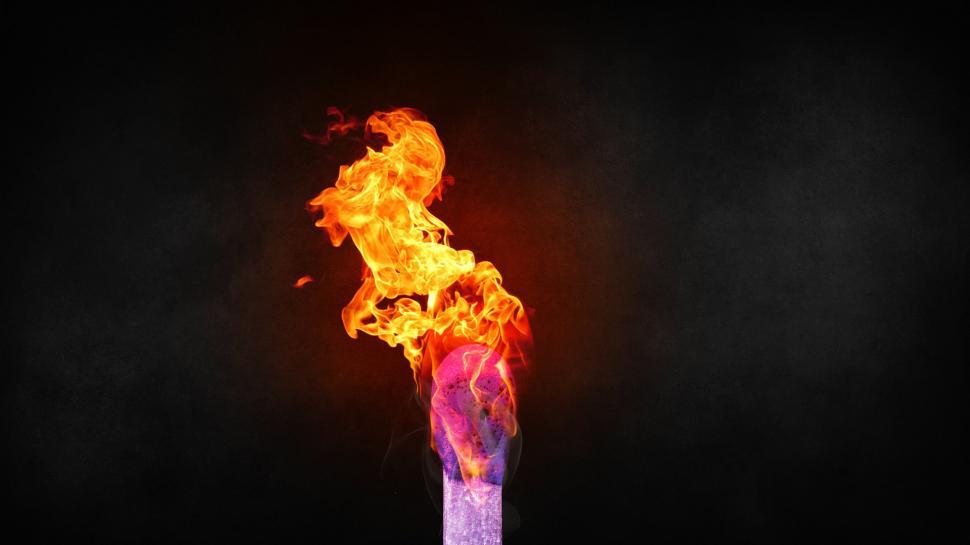 Free Image of Ignited Matchstick With Flames on Black Background 