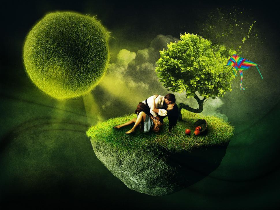 Free Image of Couple Sitting on Top of a Green Island 
