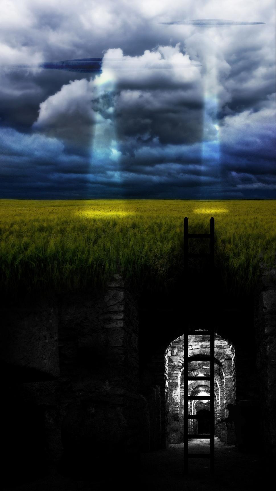 Free Image of Doorway Standing in the Middle of a Field 