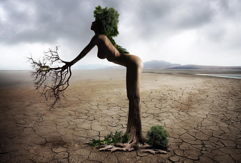 Free Image of Naked Woman Standing in Desert 