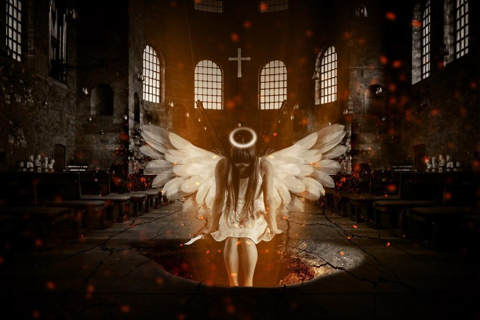 Free Image of Woman With Angel Wings in Dark Room 