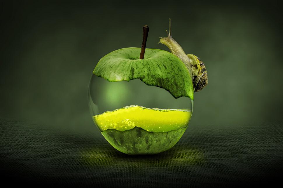 Free Image of Green Apple With Slice Cut Out 