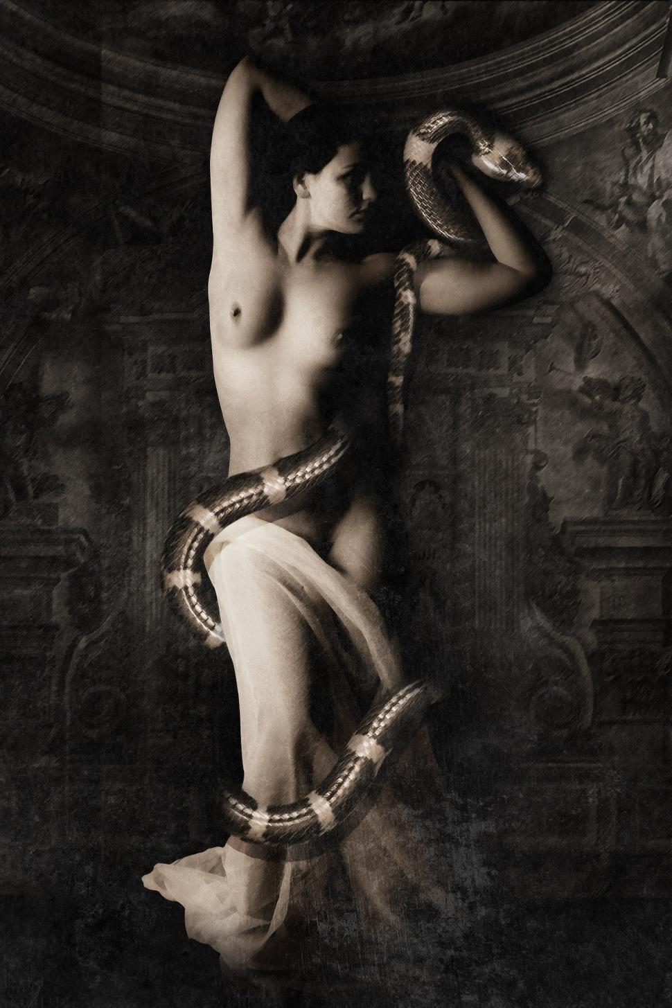 Free Image of Nude Woman With Snake Around Her Neck 