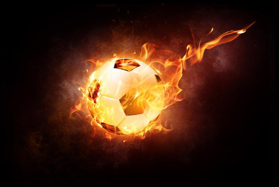 Free Image of Soccer Ball Engulfed in Flames Against Black Background 