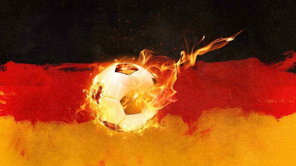 Free Image of Soccer Ball on Fire in Front of German Flag 