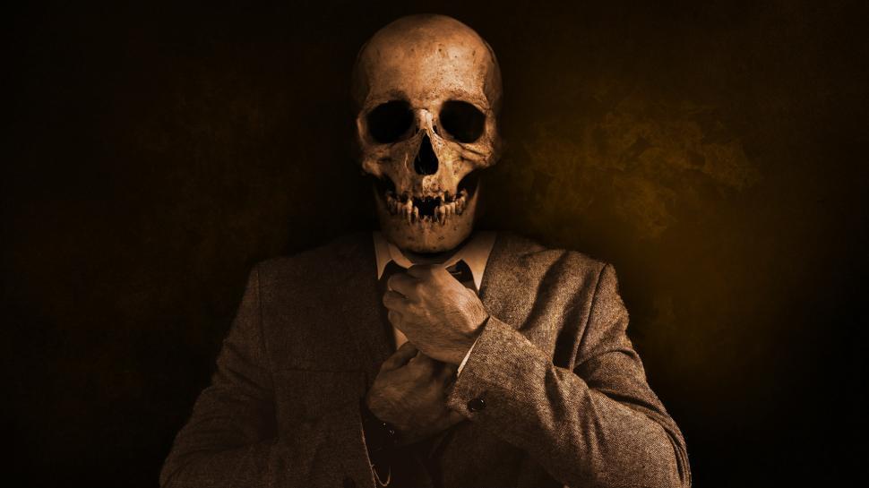Free Image of Skeleton Dressed in Suit and Tie 