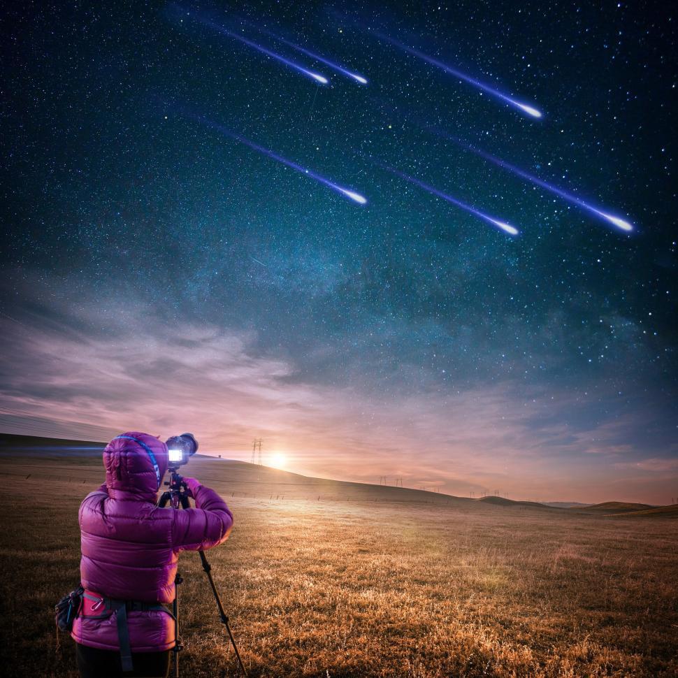 Free Image of Person in Purple Jacket Looking at Stars in Sky 