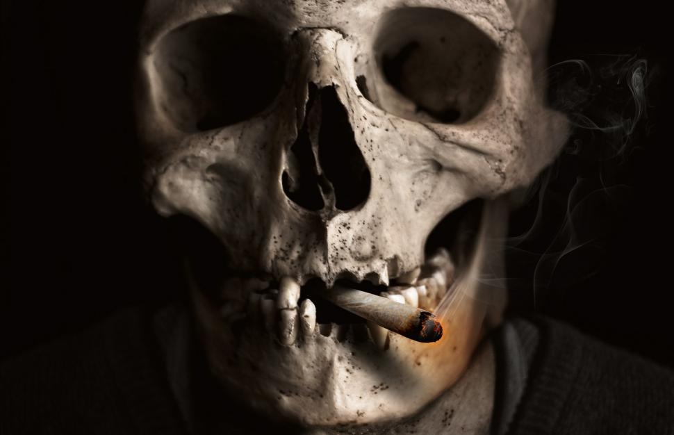 Free Image of Man Smoking Cigarette 