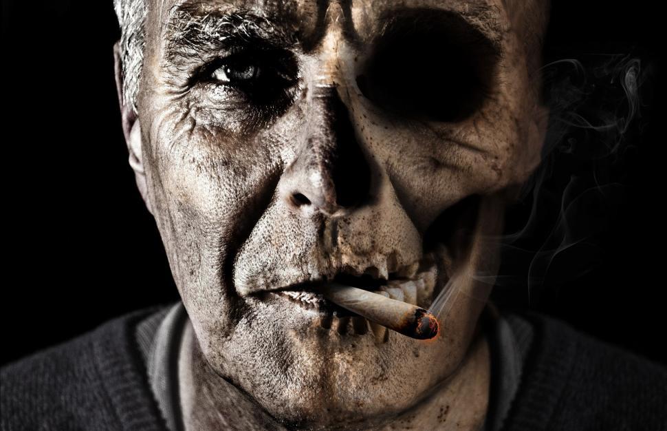 Free Image of Man Smoking a Cigarette 