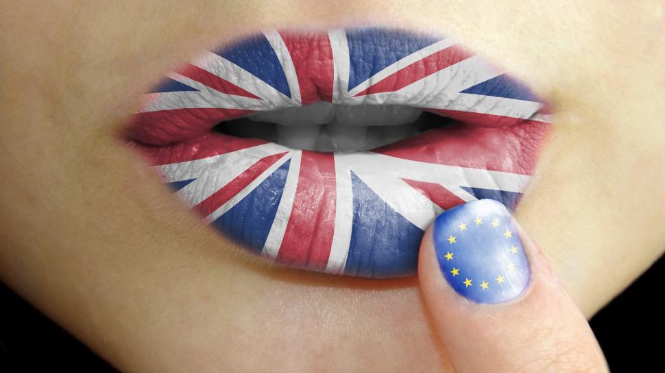 Free Image of Womans Lips Painted With the British Flag 