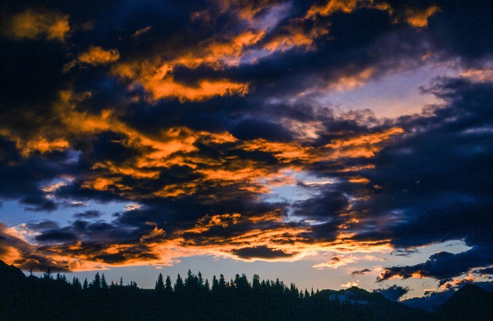 Free Image of Dark clouds during sunset  