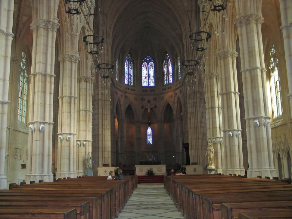 Free Image of Grand Cathedral Interior With Pews and Chandelier 